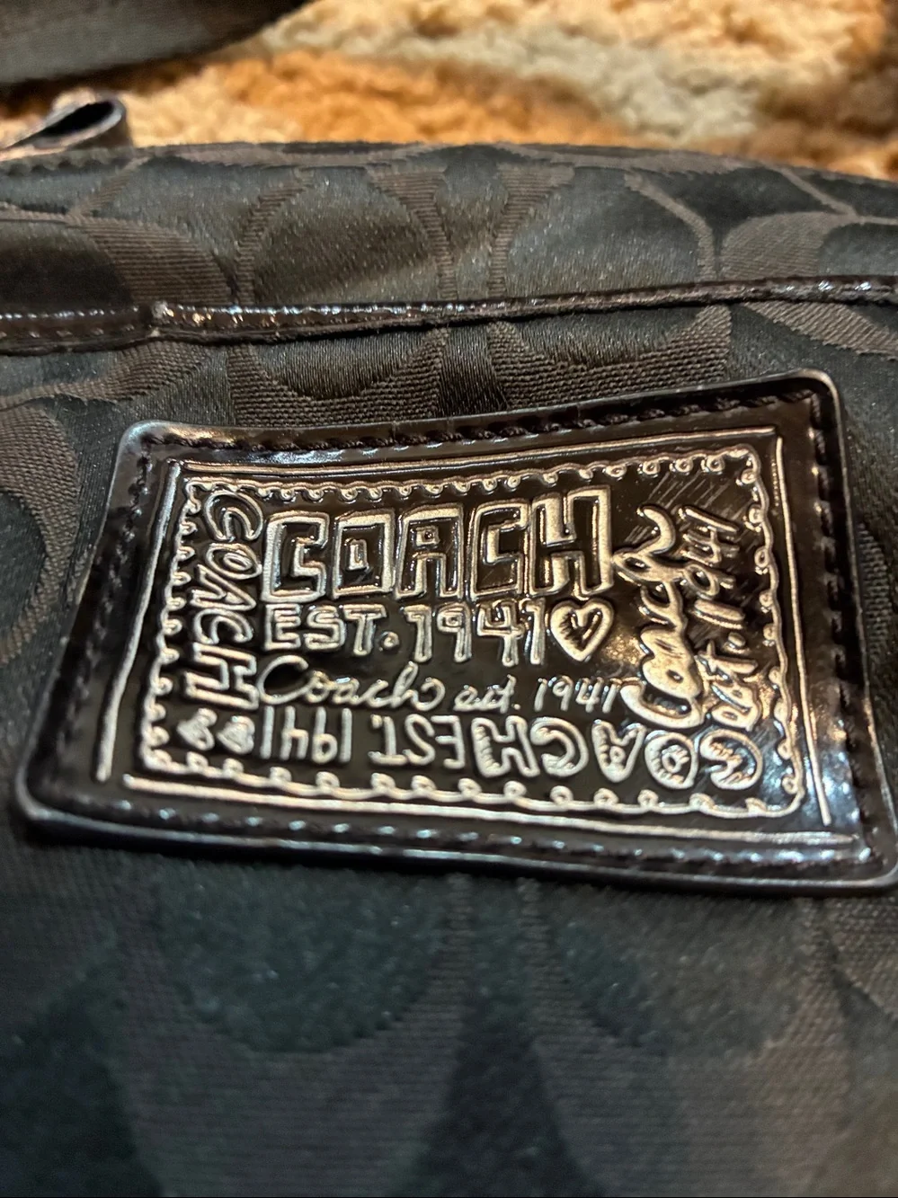 Coach Black Signature Crossbody Purse.Signature logo all over the bag.